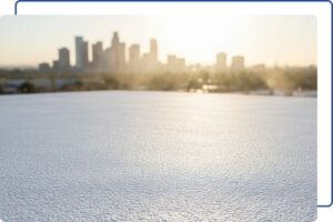 A close-up of high-reflectivity foam roofing material providing thermal insulation against the intense Phoenix sun.